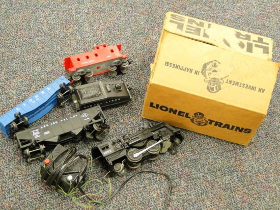 Group of Lionel trains to include engine, coal car: Group of Lionel trains to include engine, coal car, flat car and more Est. Value $50-$60
