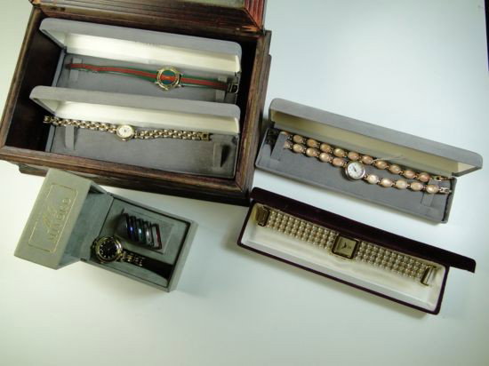 Dresser box filled with brand new watches Est. Val: Dresser box filled with brand new watches Est. Value $10-$20