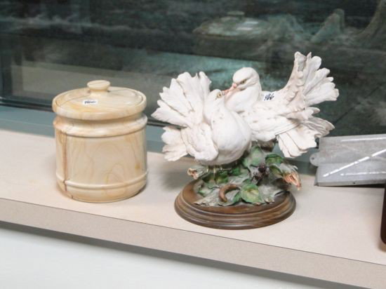 Porcelain love birds along with a carved stone hum: Porcelain love birds along with a carved stone humidor