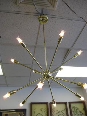 1950s professionally restored 12 arm atomic fixtur: 1950s professionally restored 12 arm atomic light fixture with starburst lights by Lincoln- Est. Value $600-$1200