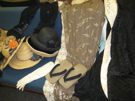 Group of womens clothing from the 1950's/60's to i: Group of womens clothing from the 1950's/60's to include: silk dresses from Tokyo, silk evening gown with jacket, oriental adult and childrens shoes, lots of misc. brimmed hats and misc. pieces -