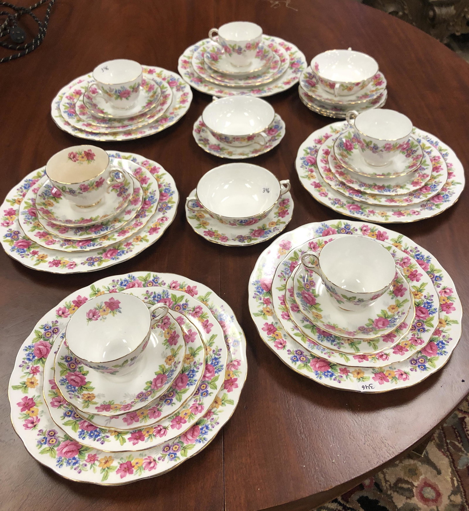 Melba Bone China Service for 6: This set includes: 6 cups and saucers, 3 bullion cups and plates, 6 dinner plates, 6 luncheon plates, 6 bread and butter plates.
