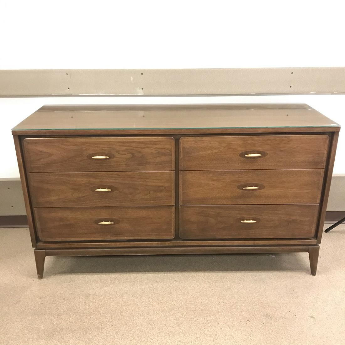 Kent Coffey Simplex ll Longboy Dresser: This walnut and pecan six drawer dresser is by Kent Coffey from their Simplex ll collection. It has brushed finished pulls, and pecan detailing aorund the pulls. It has a custom fitted glass top. It m