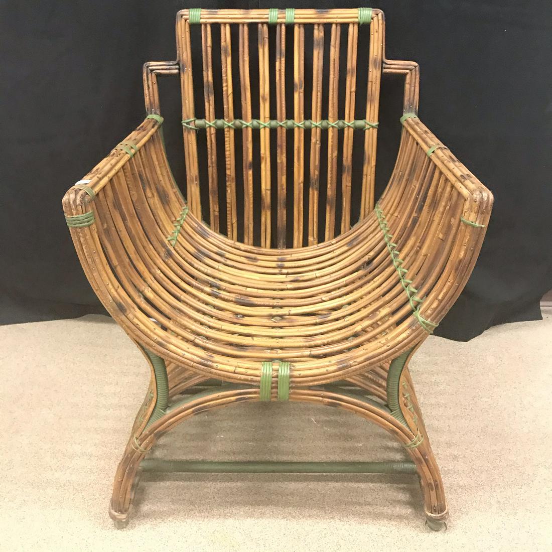 Art Deco Bamboo Chinoiserie Armchair: This Art Deco 1930's Chinoiserie bamboo armchair has green colored wrappings. In good condition, it measures 36" tall X 25" across X 25" deep.