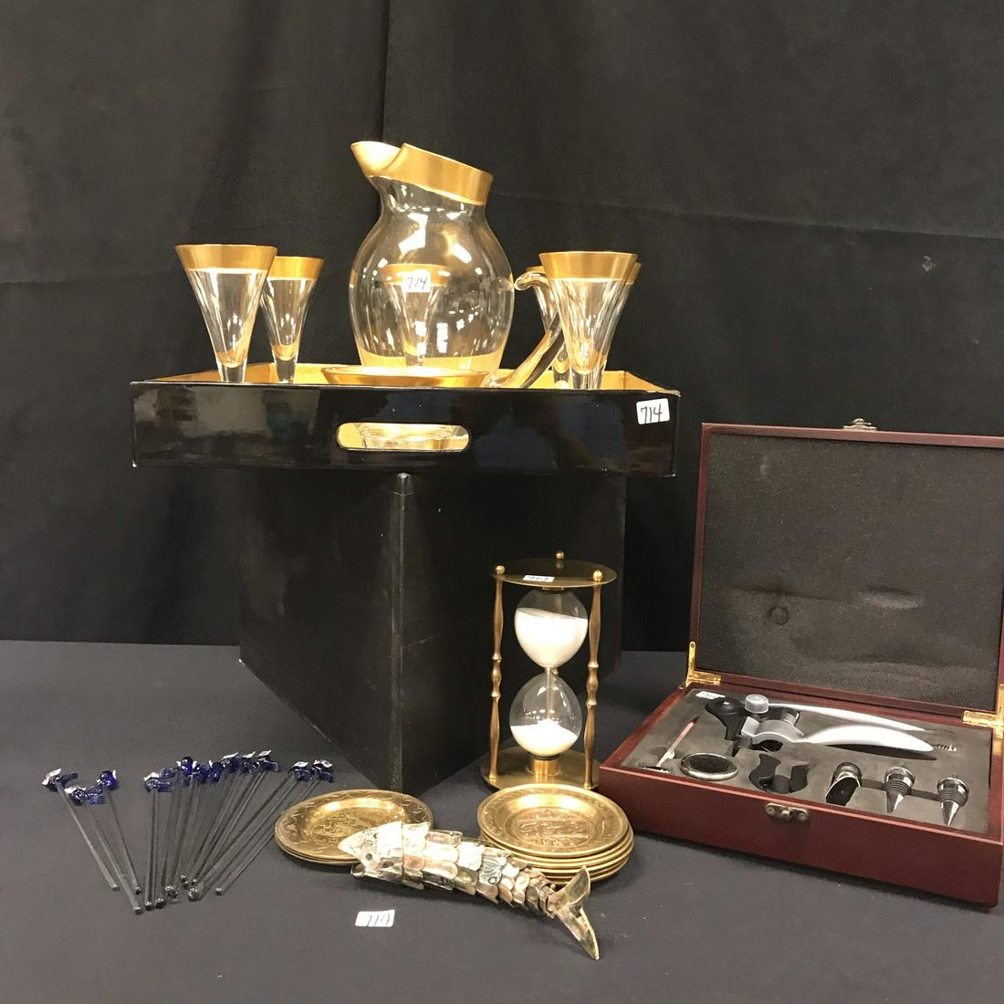MCM Gold Cocktail Set, Barware: This group of MCM barware include: a gold trimmed cocktail set with a hand blown cocktail pitcher, 6 glasses, and a catch bowl in a laquered tray; 12 hand-blown owl swizzle sticks; an abalone inlaid r