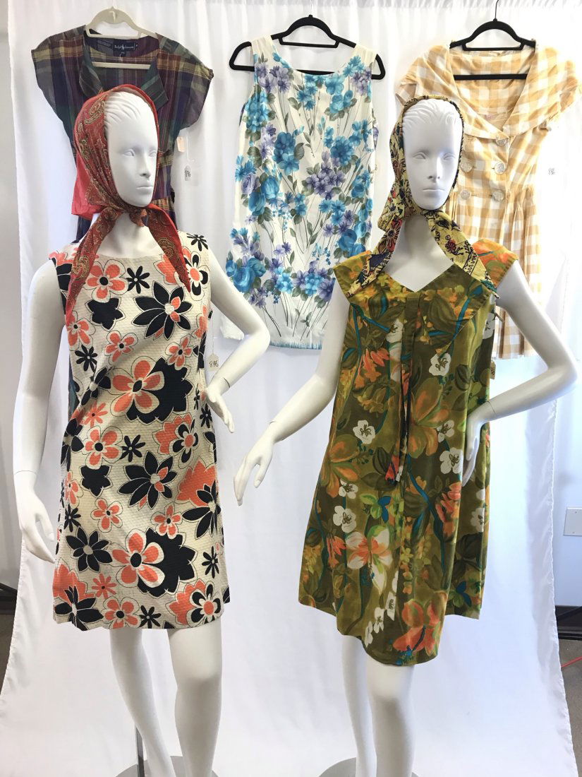 Vintage Group of Ladies Cotton Dresses: This group of cotton vintage ladies' dresses include a 60's sleeveless mod floral print cotton piquet dress, a polished cotton 1960's sleeveless Hawaiian floral print dress, a double-breasted short sl