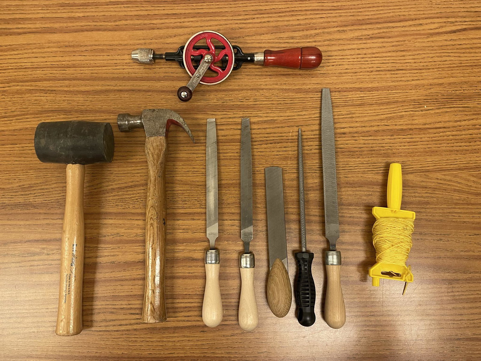 Lot to include 5 files, 2 hammers, 1 hand drill and roll of string (1 of 3)