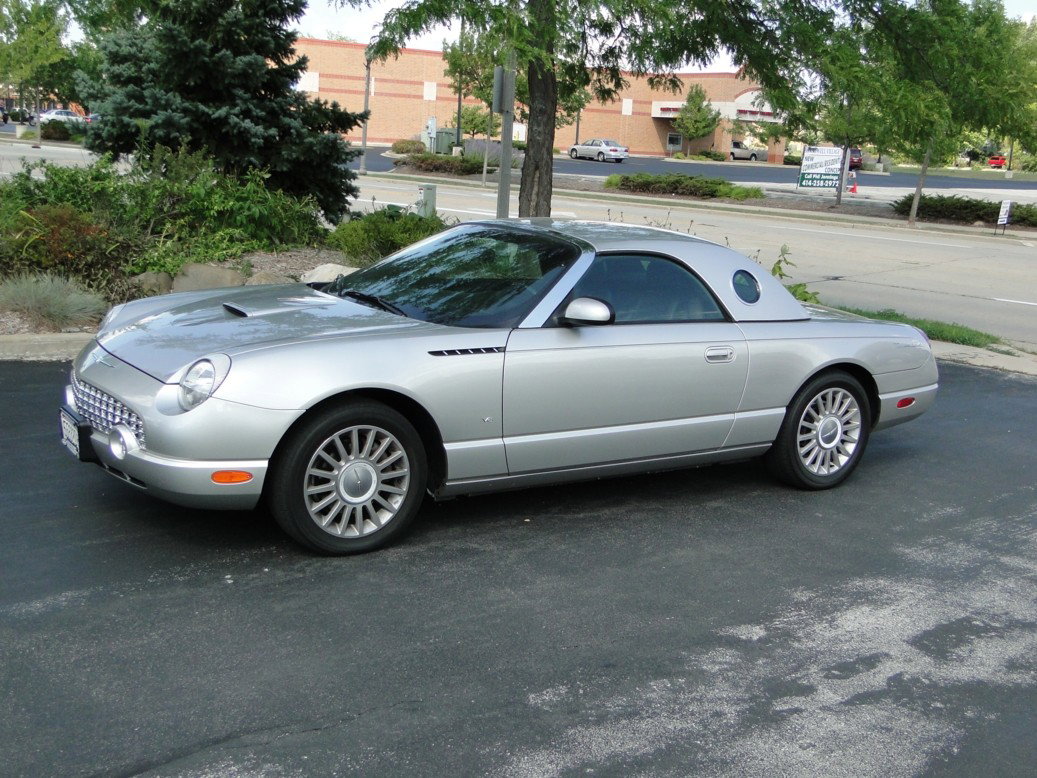 Great condition 2004 Ford Thunderbird with removabl: Great condition 2004 Ford Thunderbird with removable hard top, 27,573 miles. With extra's.
