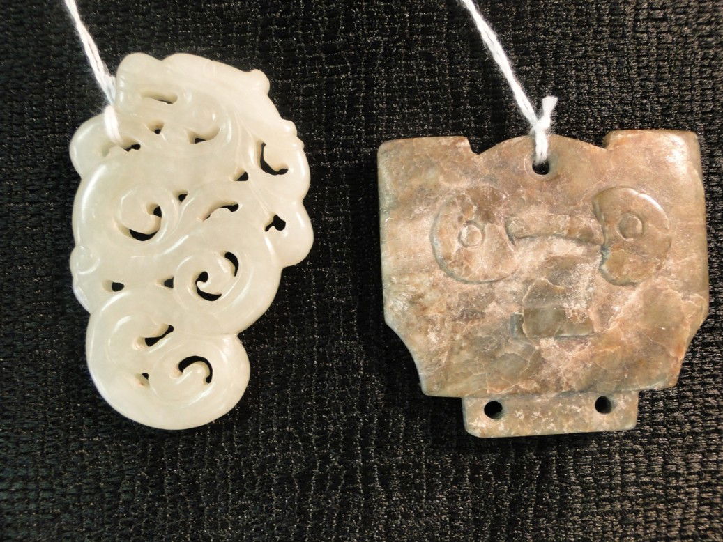 Quality hand carved piece of jade depicting a drag: Quality hand carved piece of jade depicting a dragon along with a hard stone oriental pendent deacquisitioned from a Chicago museum . Est. value $100-200