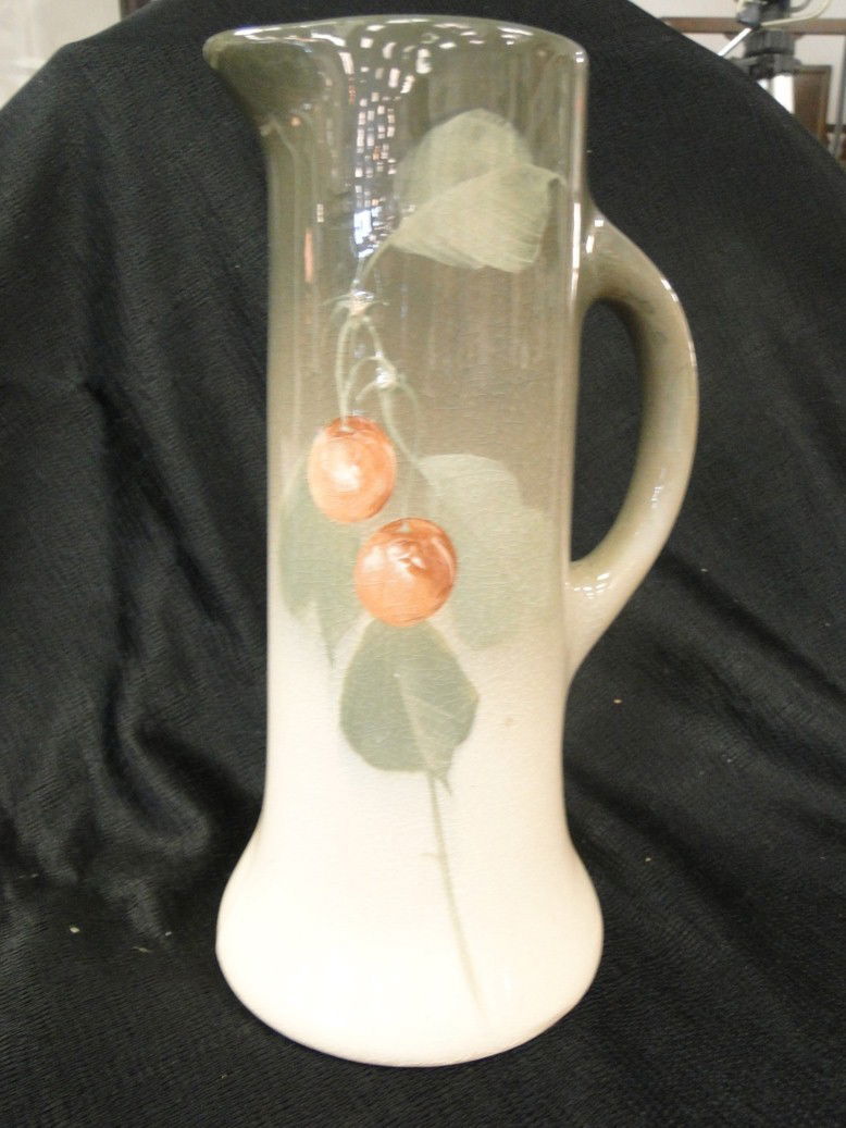 Unsigned Roseville royal tankard depicting cherrie