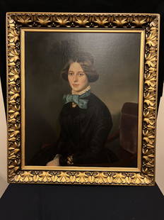 Pre Civil War Victorian Portrait of Woman: An extremely well executed pre civil war portrait of a young beauty with blue ribbon, lace collar, cameo and fancy gold bracelet. Her hair is done up with a braided top in 1850s style and painting is