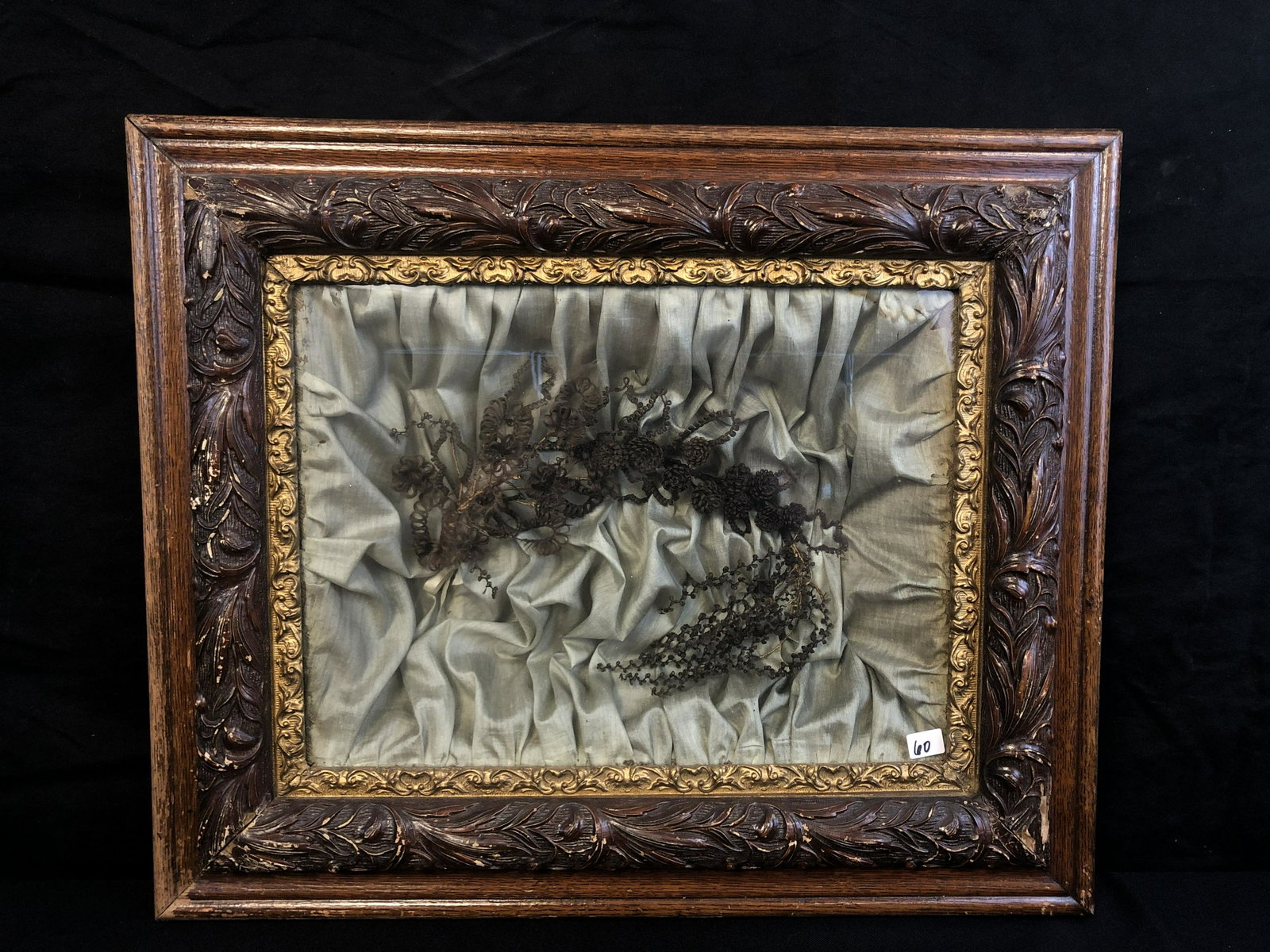Victorian Hair Art in Shadowbox: A piece of Victorian hair art in a shadow box. This piece was likely for mourning purposes. It measures 19.25" X 23".