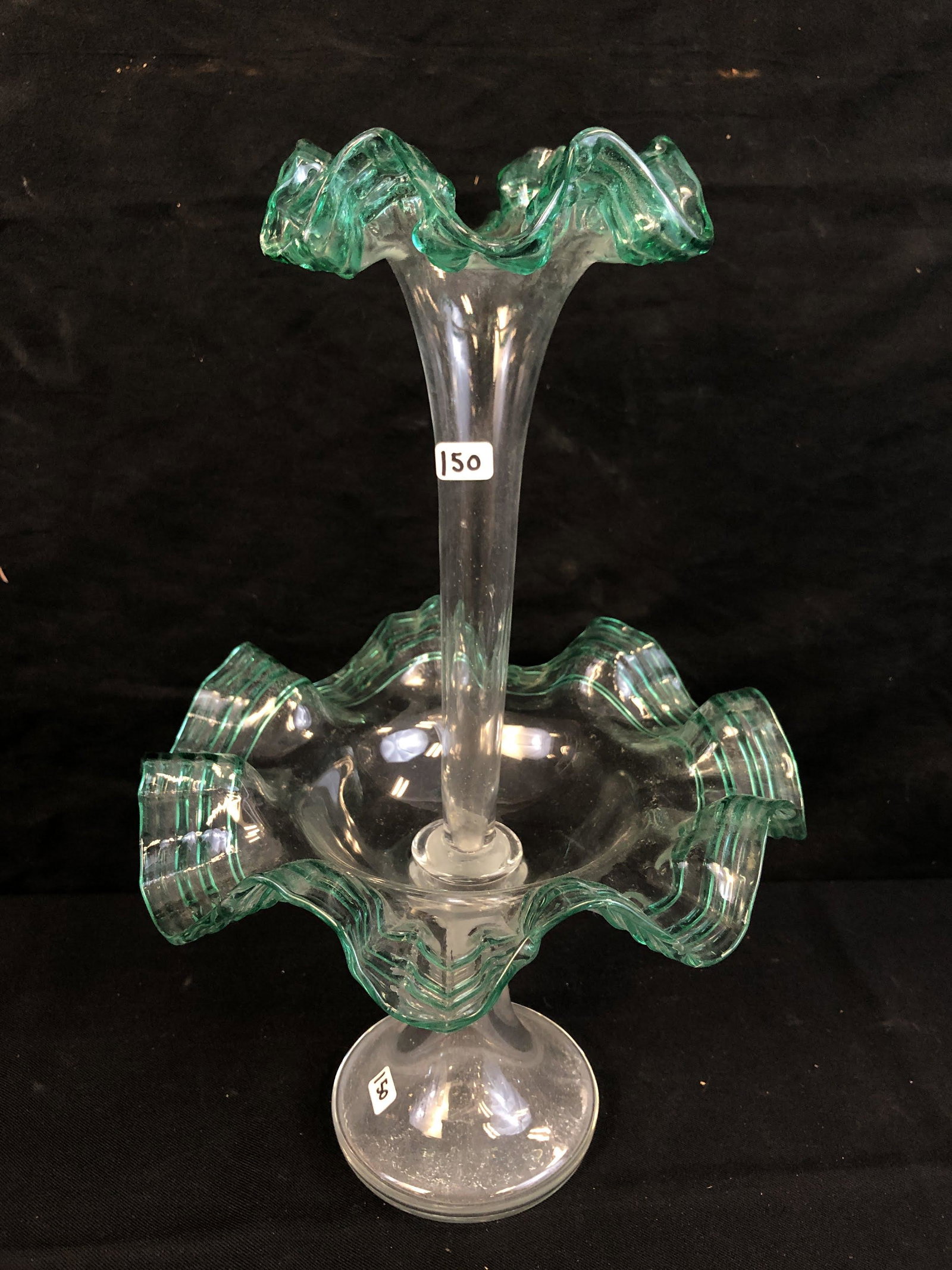 Clear and Green Ribbon Glass Ruffled Epergne: An antique Epergne in clear glass with green threading on ruffles of bowl and flute. This piece is hand blown glass and in excellent condition. This piece measures 16.25" tall X 10" across. When flute