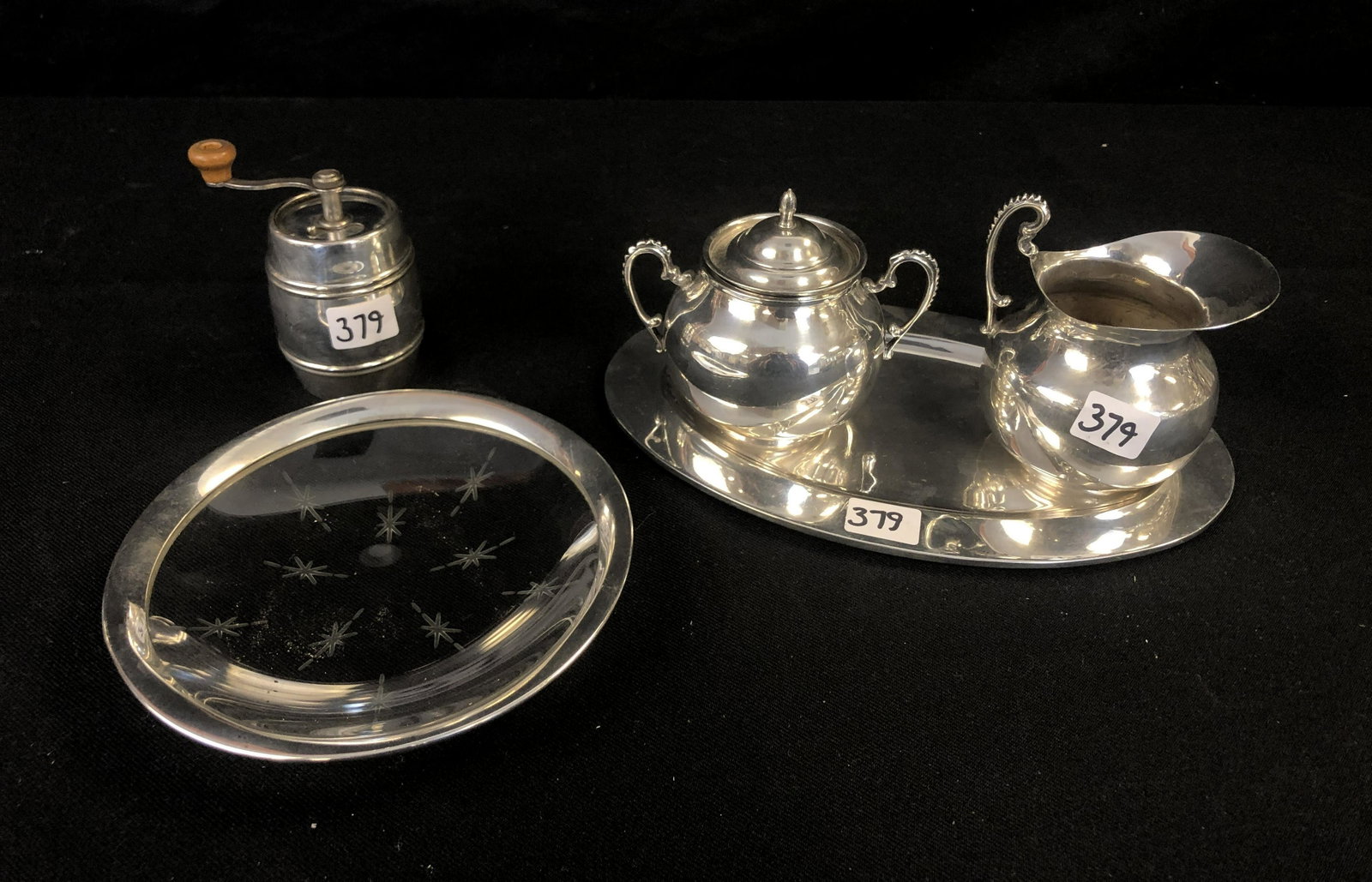 Sterling Creamer & Sugar, Pepper Grinder, and Trays.: A Mexican sterling creamer, sugar with cover and underplate which weighs 420 grams along with a crystal and sterling-trimmed plate and sterling pepper grinder.