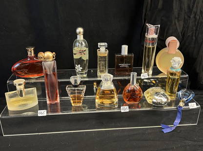 Group of Designer Perfumes used: This group of 14 desinger perfumes include Chanel Elixer Sensual, Bulgari Pour Femme, Givenchy Organza, John Varvatos for Women, Estee Lauder Pleasures Exotic, Vera Wang, Chloe, Ellen Tracey BRONZE, L