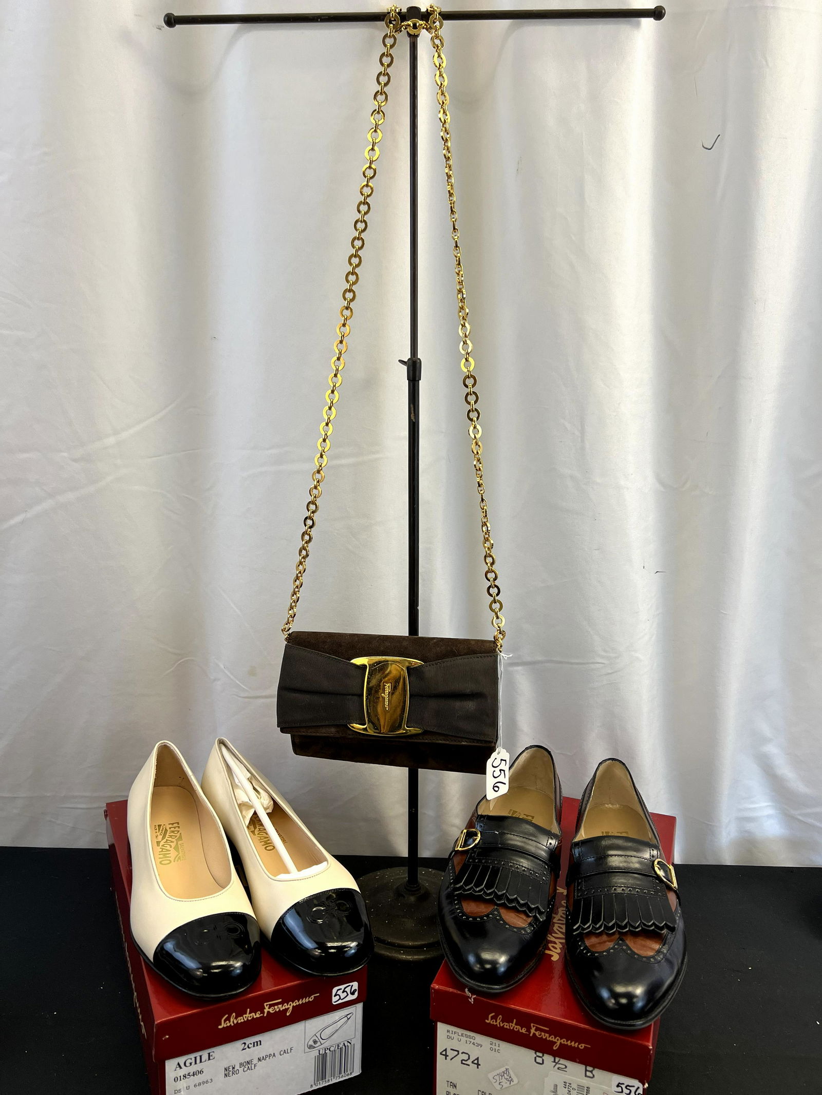 Ferragamo Evening Bag and 2 Pairs Leather Shoes-8.5: This group of Ferragamo ladies furnishings include a brown suede evening bag with a large circlet gold chain and grosgrain bow (5" tall X 7.5" across), an unworn pair of leather low heeled shoes with