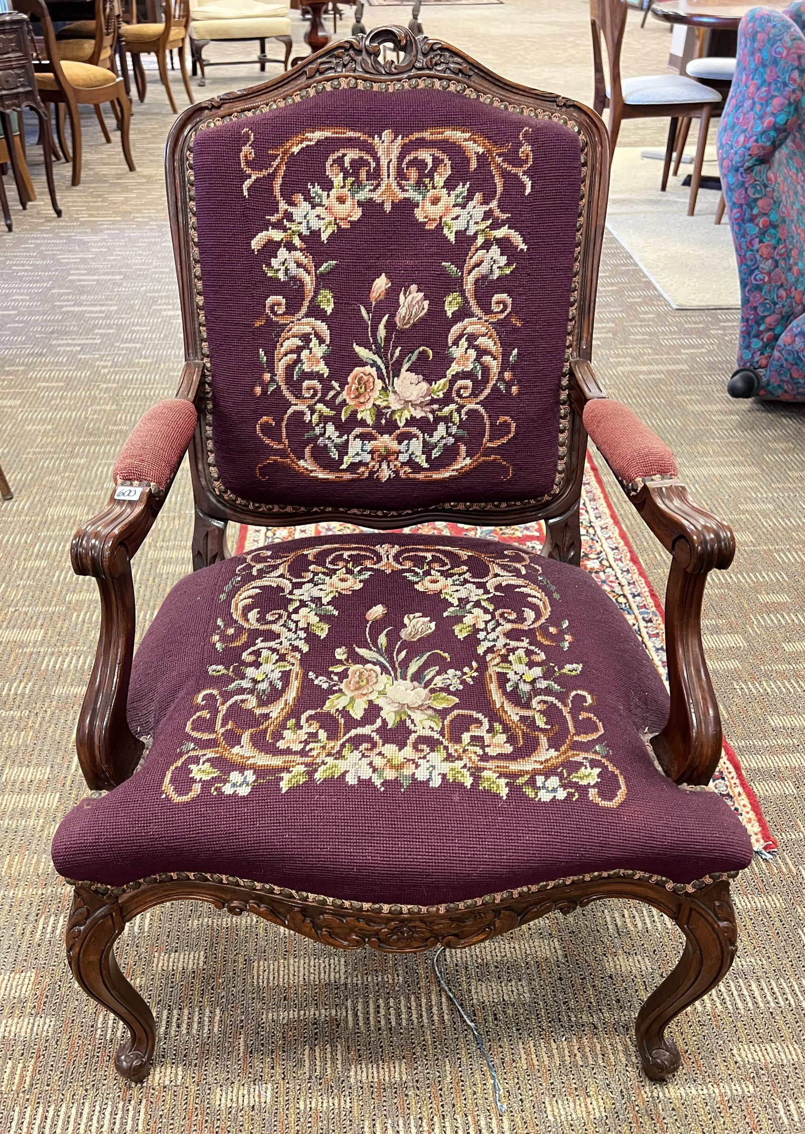 French Baroque Armchair w/ Petit Point Seat: An outstanding French Baroque floral carved with needlepoint and petit point armchair. It measures 36" tall X 21.5" across X 20" deep.