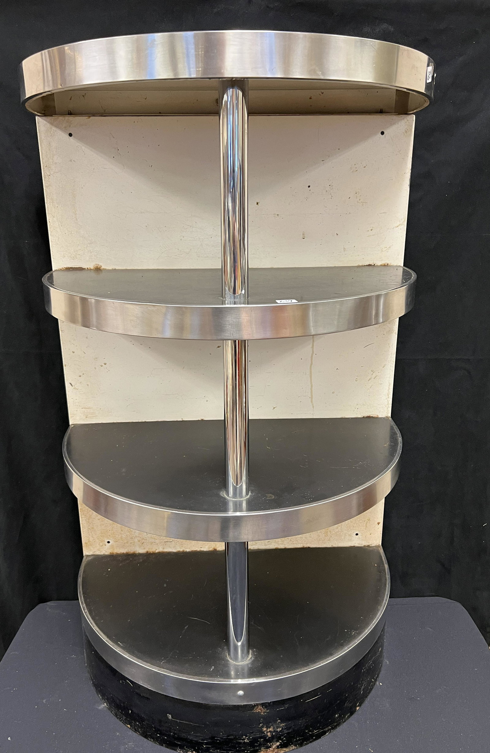 Four-Tiered Art Deco Chrome & Black Enameled Shelf: A four-tiered Art Deco chrome enameled and black painted shelf.