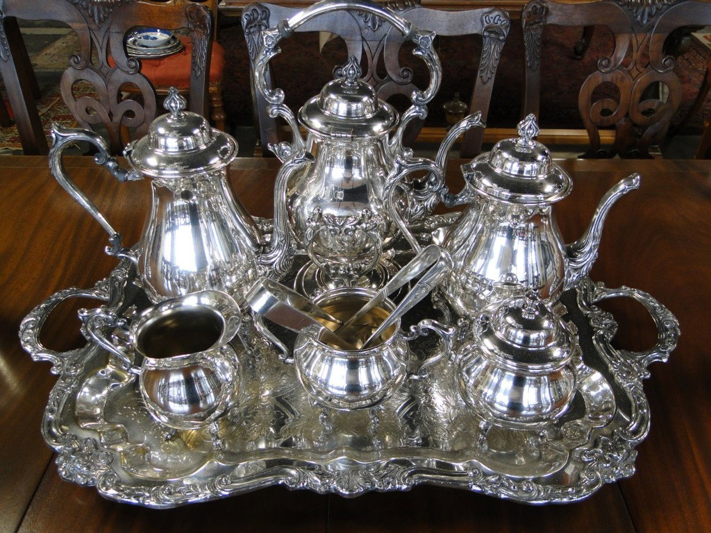 Quality silver service consisting of tilting hot w: Quality silver service consisting of tilting hot water kettle, coffee pot, teapot, waste bowl with 2 pair of tongs, creamer and covered sugar, and a large footed double-handled serving tray by Sherida
