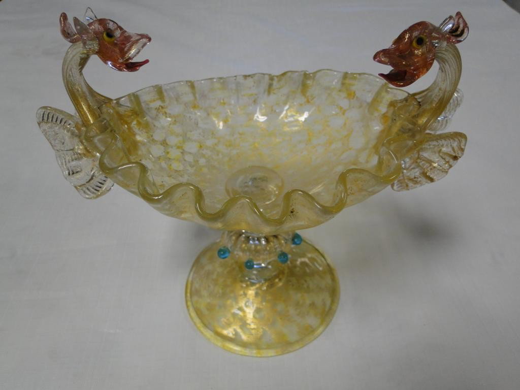 An extremely early Venetian glass compote with dra: An extremely early Venetian glass compote with dragon handle; 6"Hx9"W