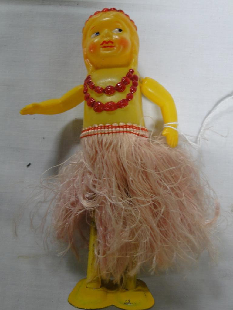 Key wind celluloid hula girl on metal feet; 6 1/2" : Key wind celluloid hula girl on metal feet; 6 1/2" T