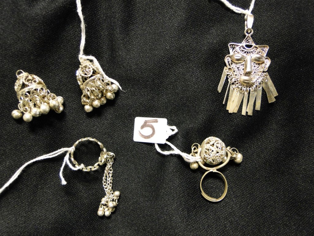 Group of Middle eastern silver jewelry to include : Group of Middle eastern silver jewelry to include rings, earrings, etc.