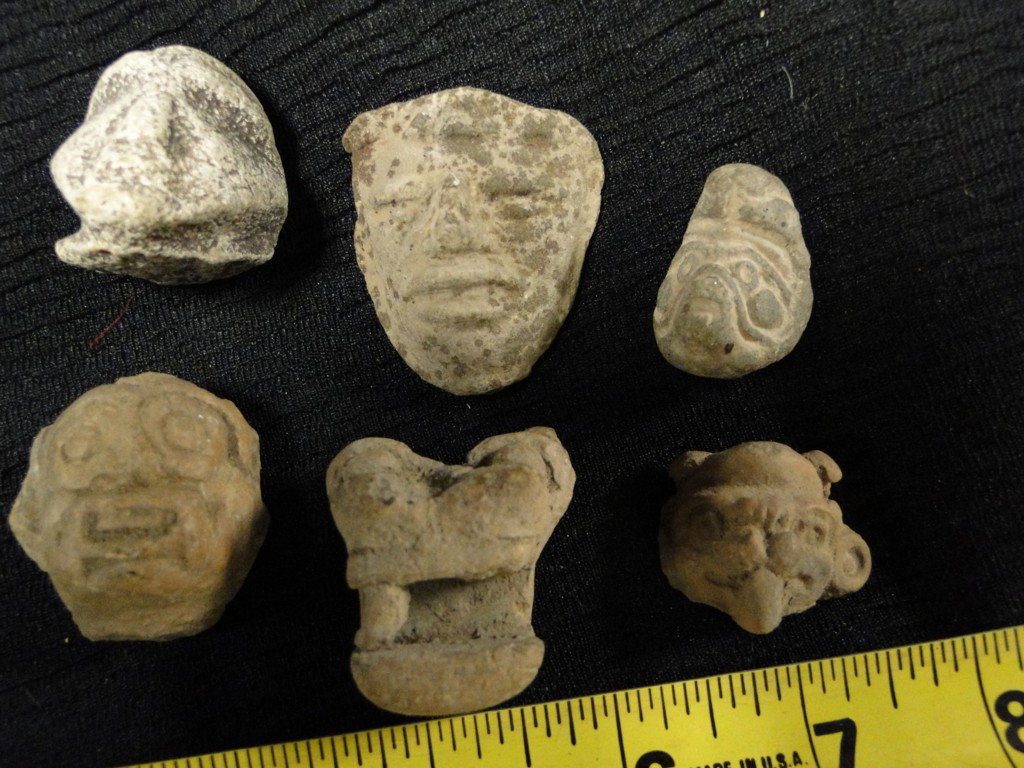 A group of six Mayan or pre-Columbian pottery frag: A group of six Mayan or pre-Columbian pottery fragments depicting faces