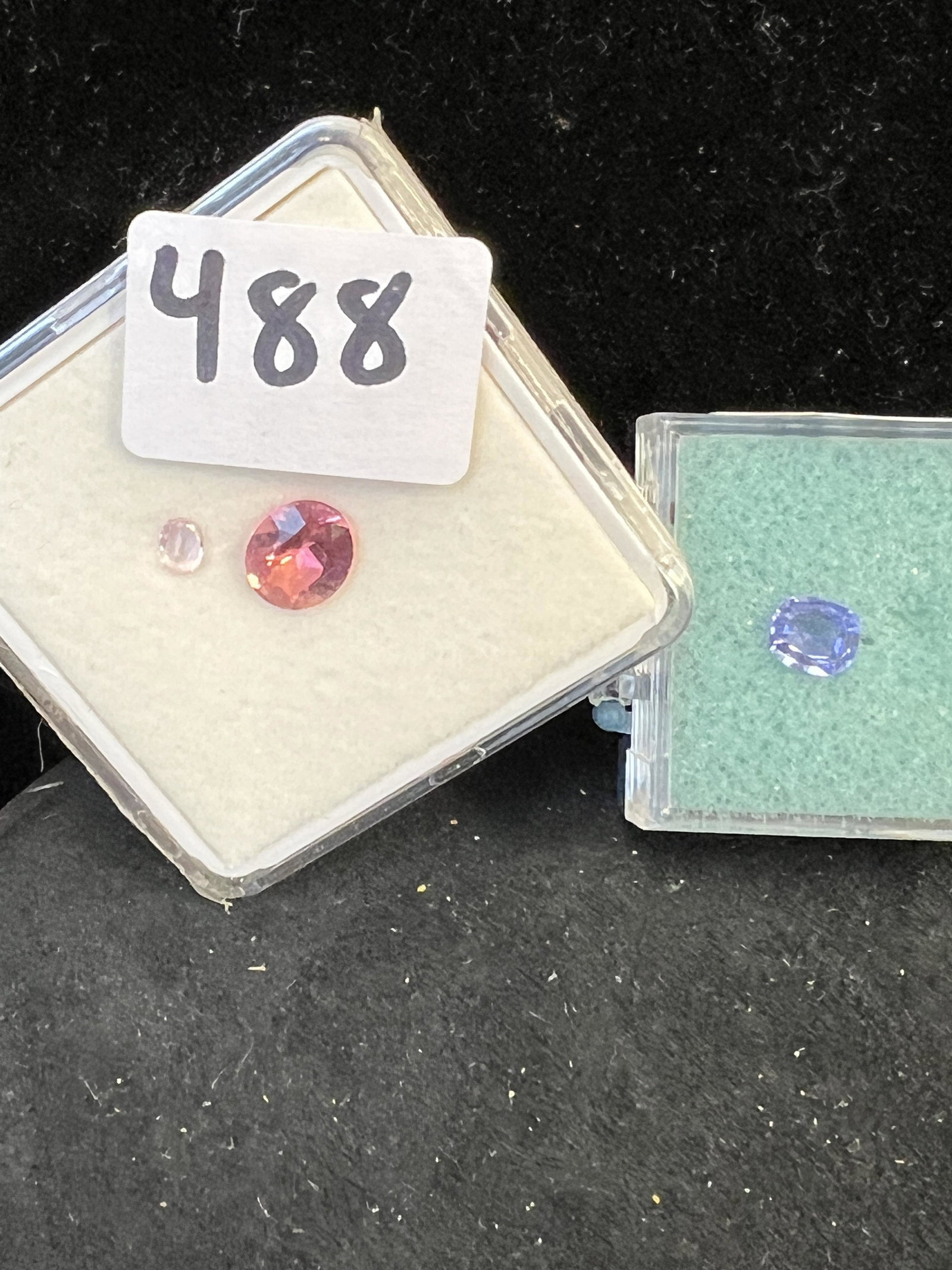 1 ct Tanzanite and Pink Tourmaline Loose Stones: Loose stones to include a 1ct tanzanite, a pink tourmaline (size unknown) and a smaller pink stone (possibly pink tourmaline).