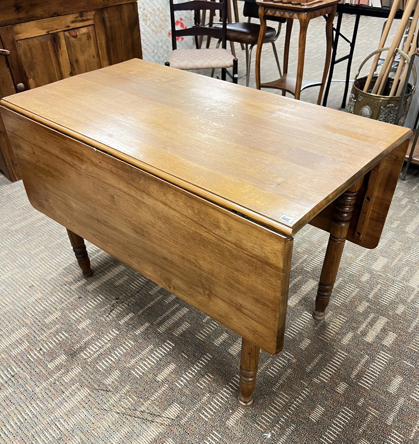 Drop-Leaf Work Table: A drop-leaf work table. With the drops down, it measures 29" tall X 41" across X 22" deep, and each drop adds 15" of depth.