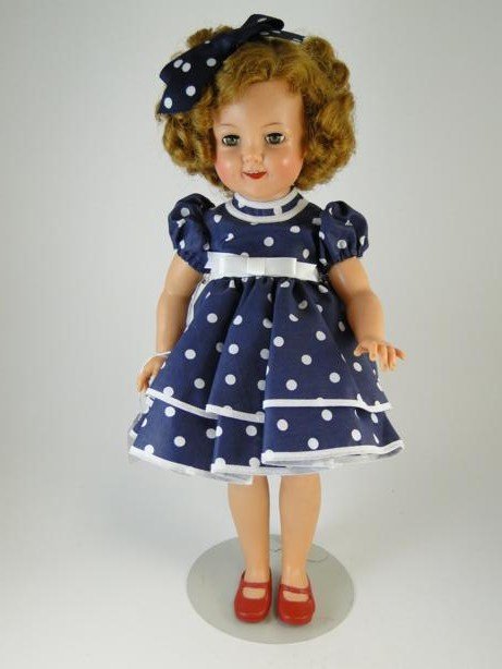 Medium size, plastic Ideal Shirley Temple doll with: Medium size, plastic Ideal Shirley Temple doll with original clothing