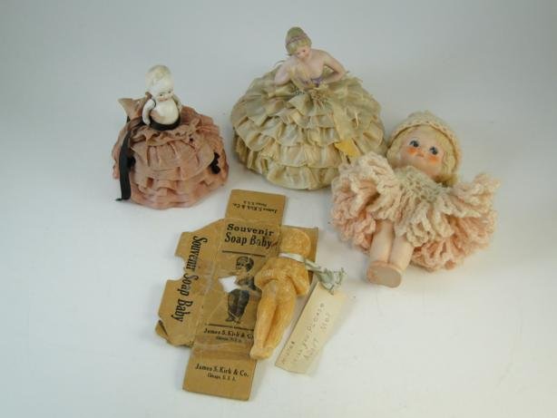 Pin cushion dolls along with bisque jointed doll a: Pin cushion dolls along with bisque jointed doll and souvenir soap doll