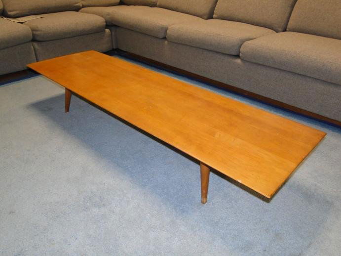 Low coffee table with signature on base by the Pla: Low coffee table with signature on base by the Planner Group designed by Paul McCobb Wicandon Furniture Company; 9.5"H x 59D x 18"W