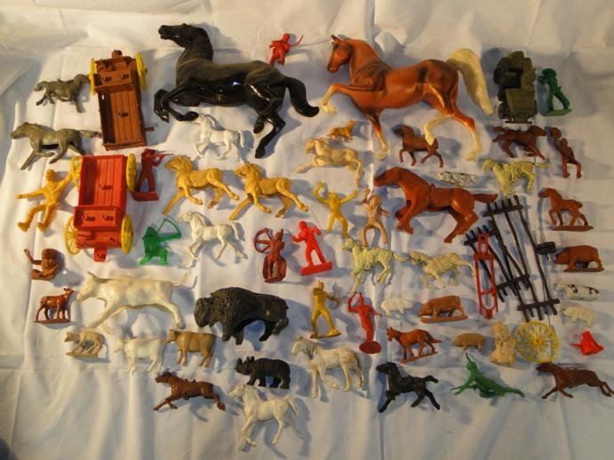 Large group of plastic horses, wagons, cowboy and : Large group of plastic horses, wagons, cowboy and Indian figurines and other plastic figurines