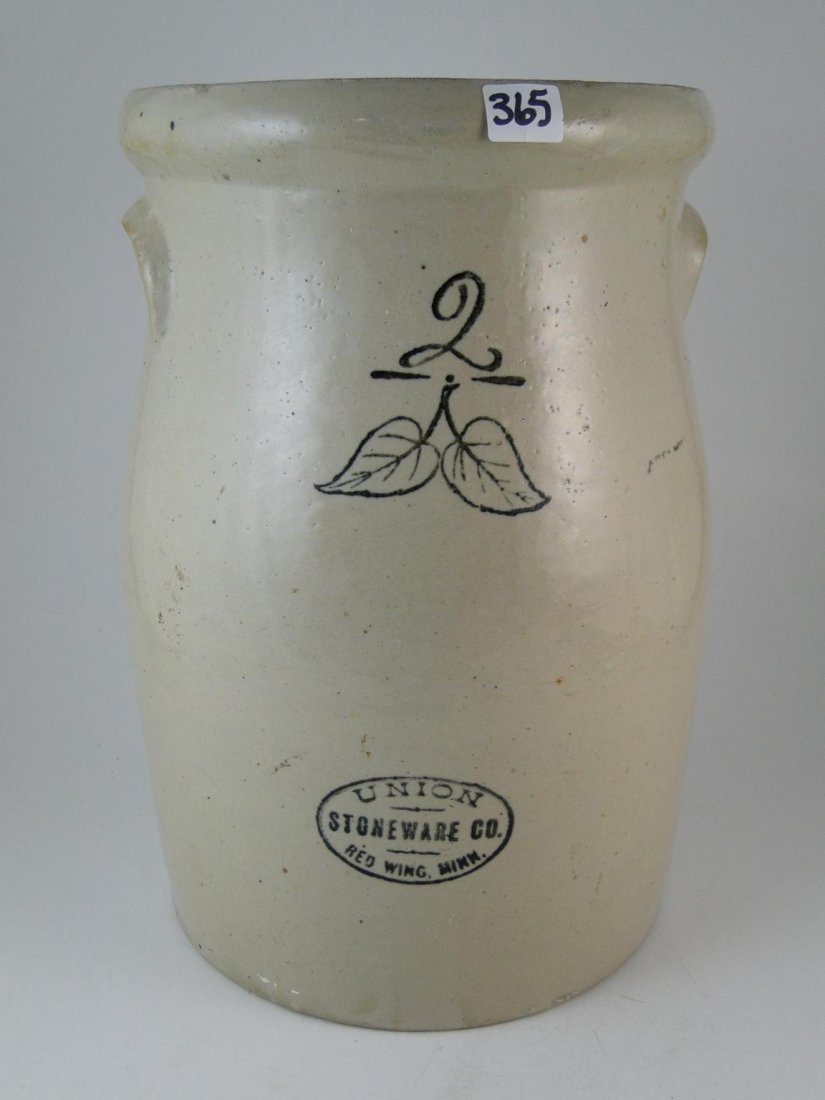 A Union Stoneware 2 gallon butter churn with over : A Union Stoneware 2 gallon butter churn with over made in Red Wing Minnesota in excellent condition. Estimate $250-$300