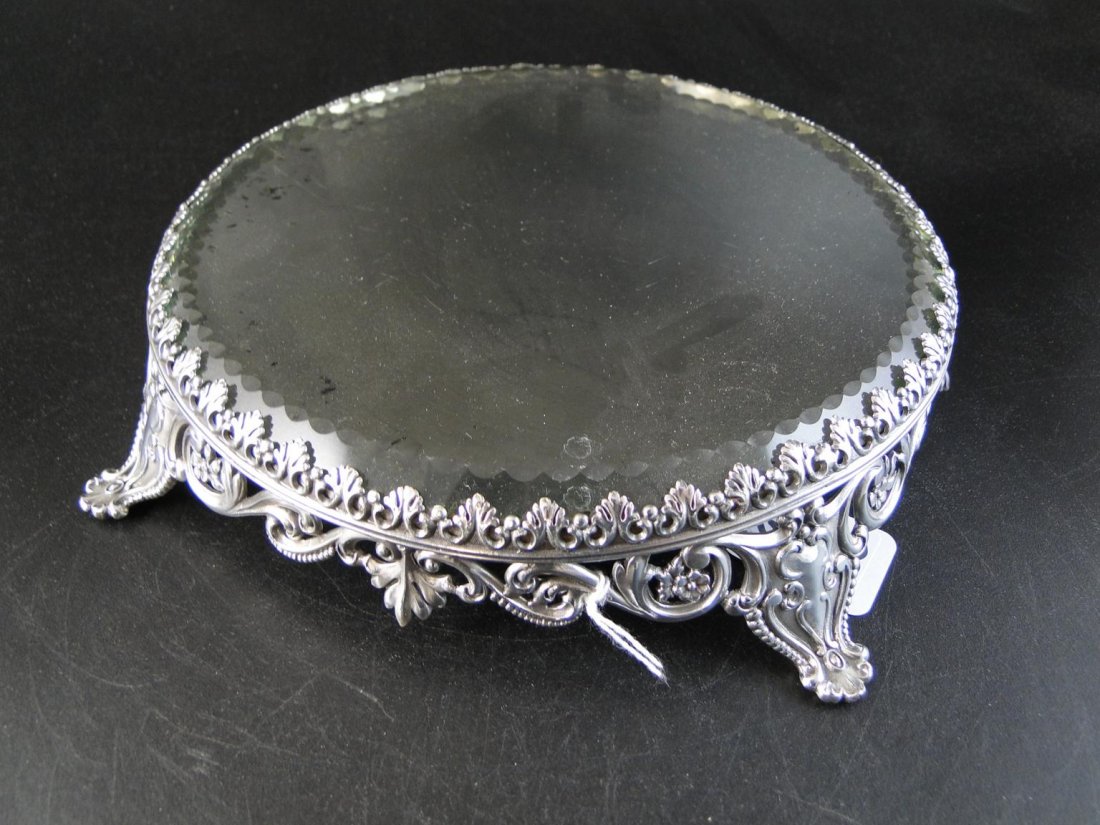 Turn of the century zipper cut mirrored plateau wi: Turn of the century zipper cut mirrored plateau with elaborate silver plate trim. Estimate $100-$150