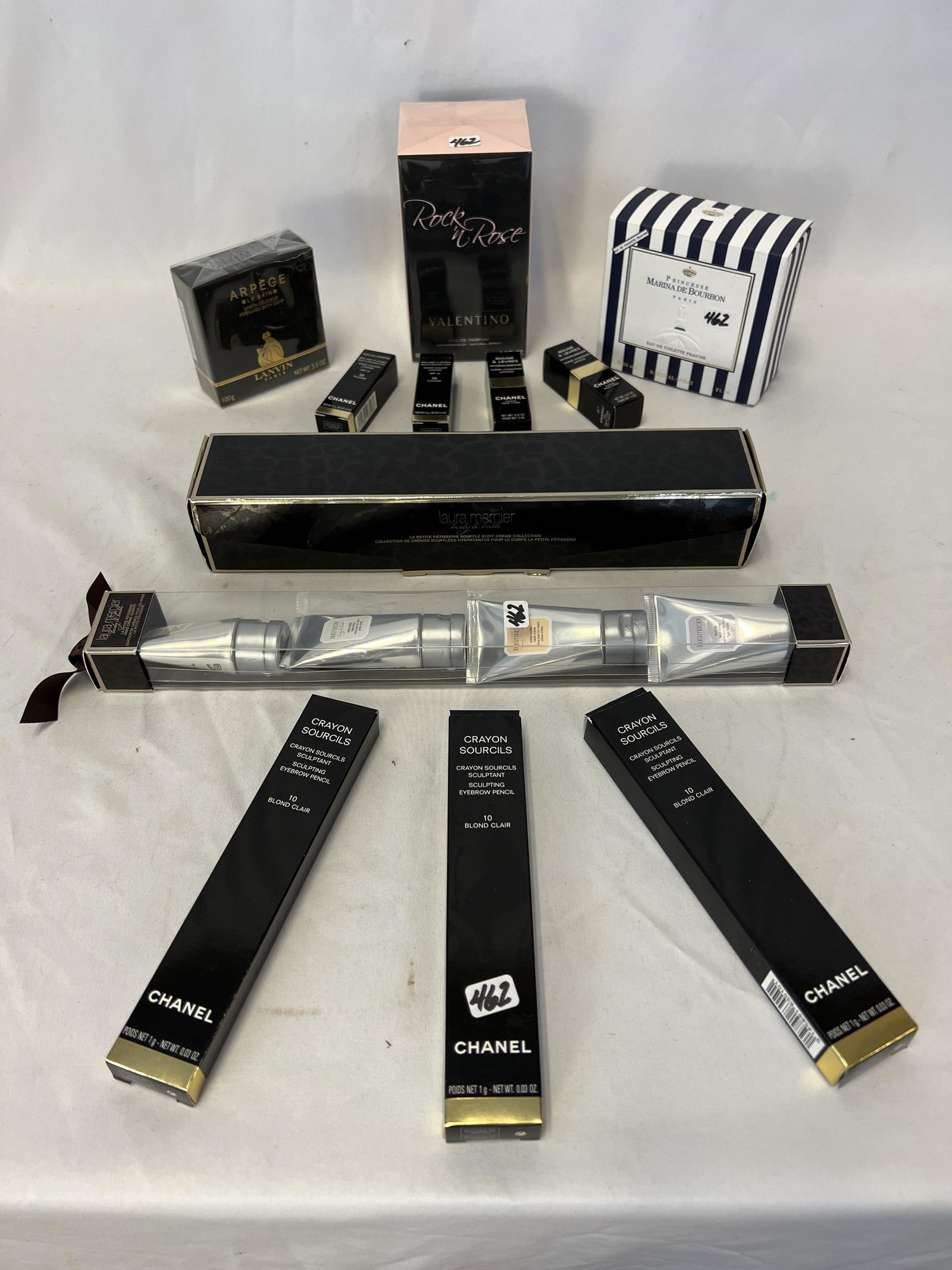 Chanel and Other Makeup & Acessories: Chanel and other makeup and accessories to include 4 Chanel number 10 crayon sourcils, 4 Chanel lipsticks, Princesse Marina de Bourbon perfume, Laura Mercier body and bath, a 4-pack of something, anot