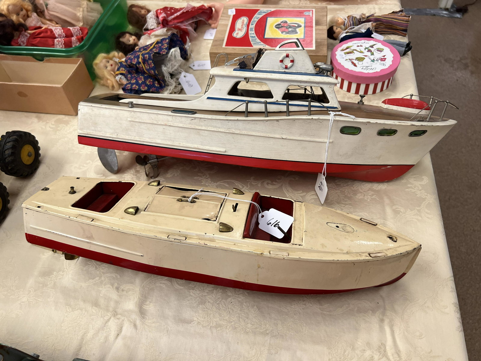 Two 1950s Motorized Boats: Two 1950s motorized boats, one wooden, and one tin. Both in need of some TLC.