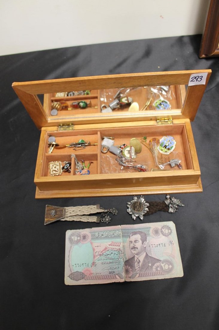 Mans jewelry box with German bolos, tie tacks, tin: Mans jewelry box with German bolos, tie tacks, tins, and a Saddam Hussein $200.0