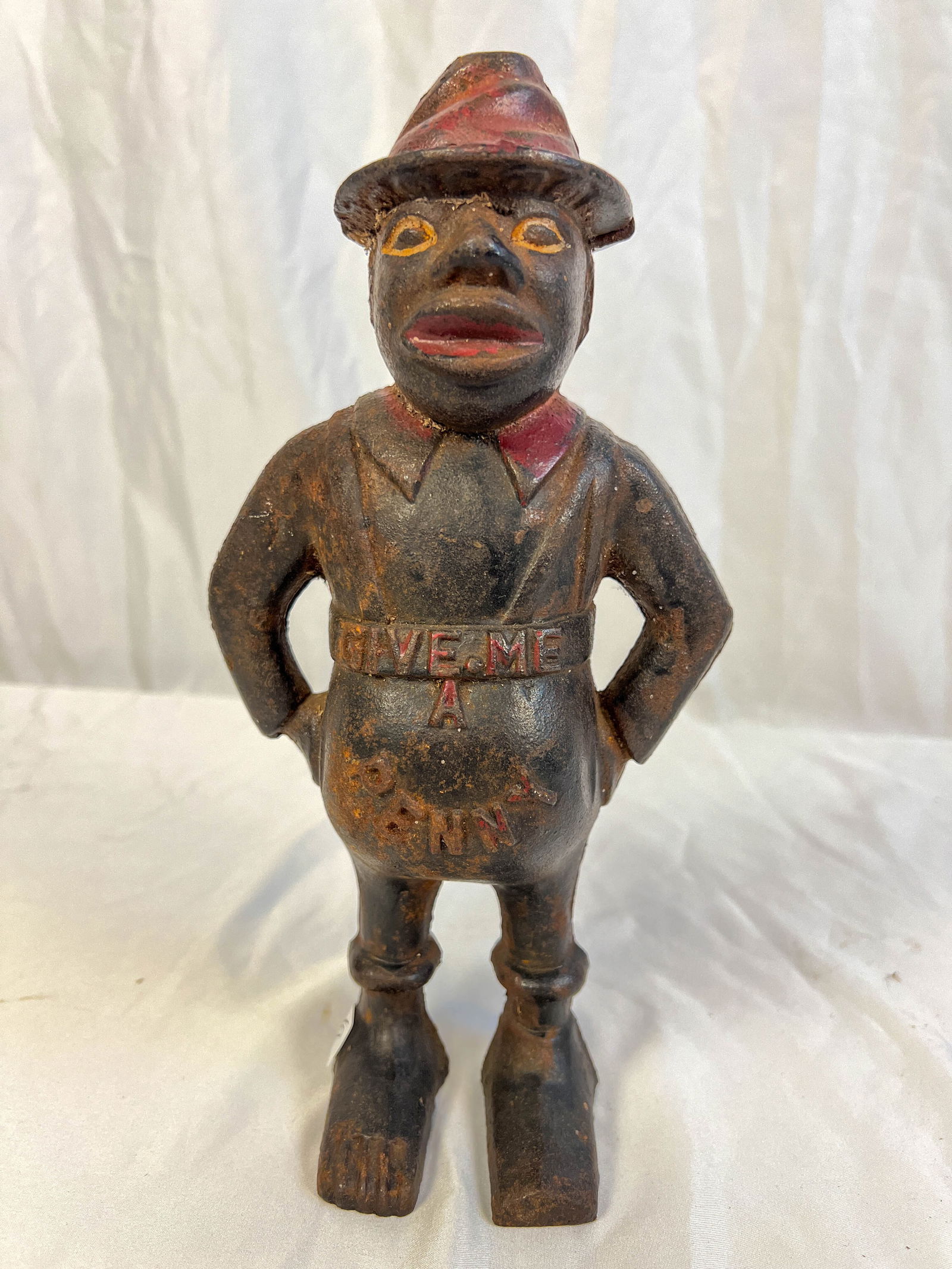 An antique cast iron bank (1 of 4)