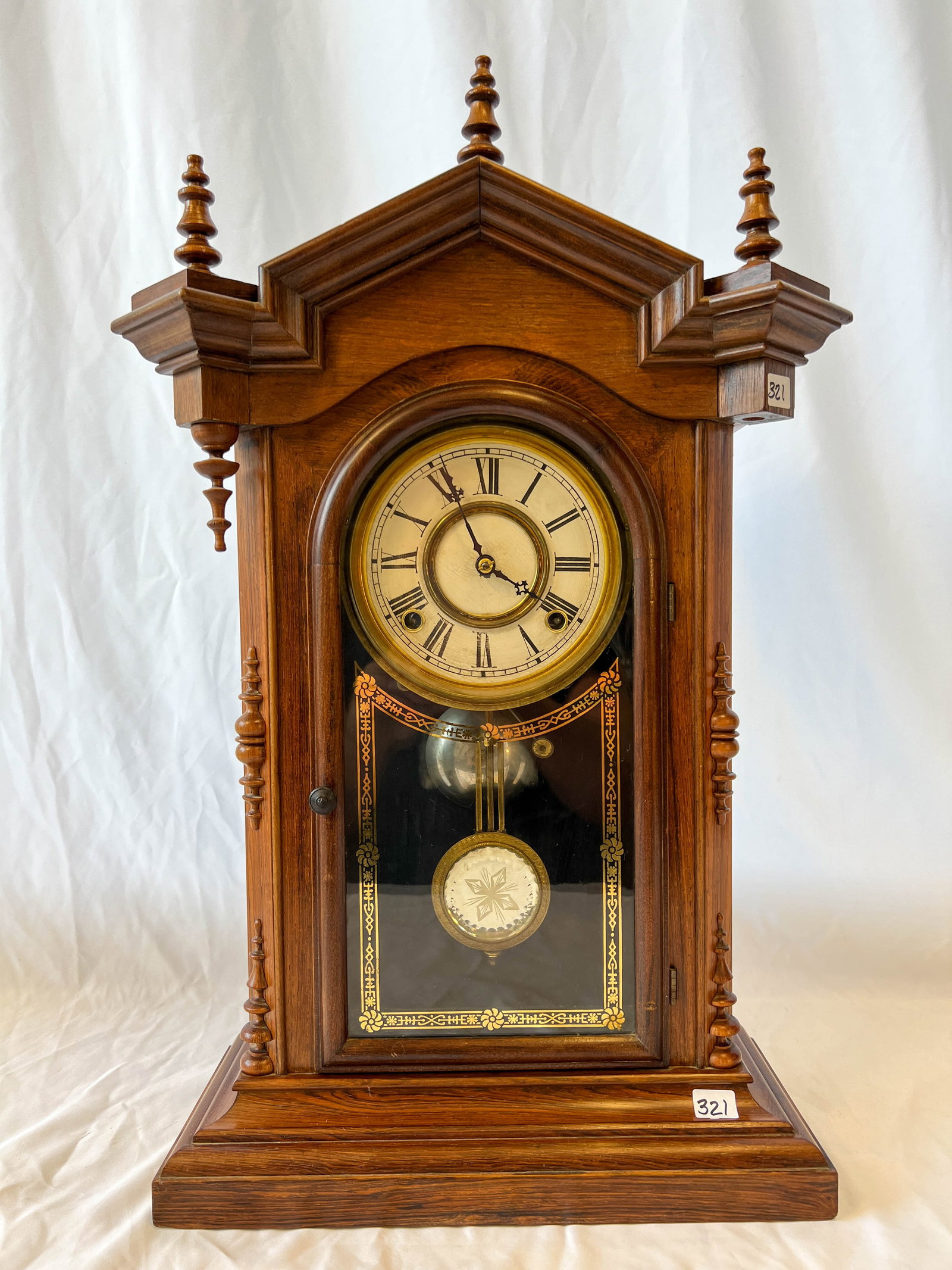 High grade walnut Victorian clock by Luca with time and strike movement.  8 day and is from (1 of 4)