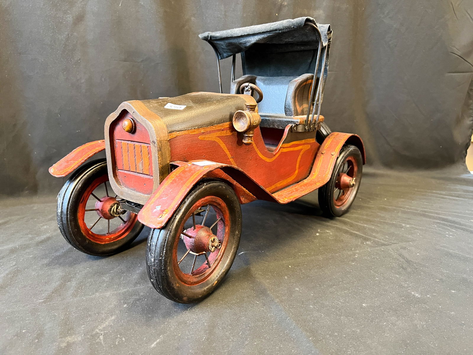 Contemporary metal and composite Model T car with canvas convertible top (1 of 4)