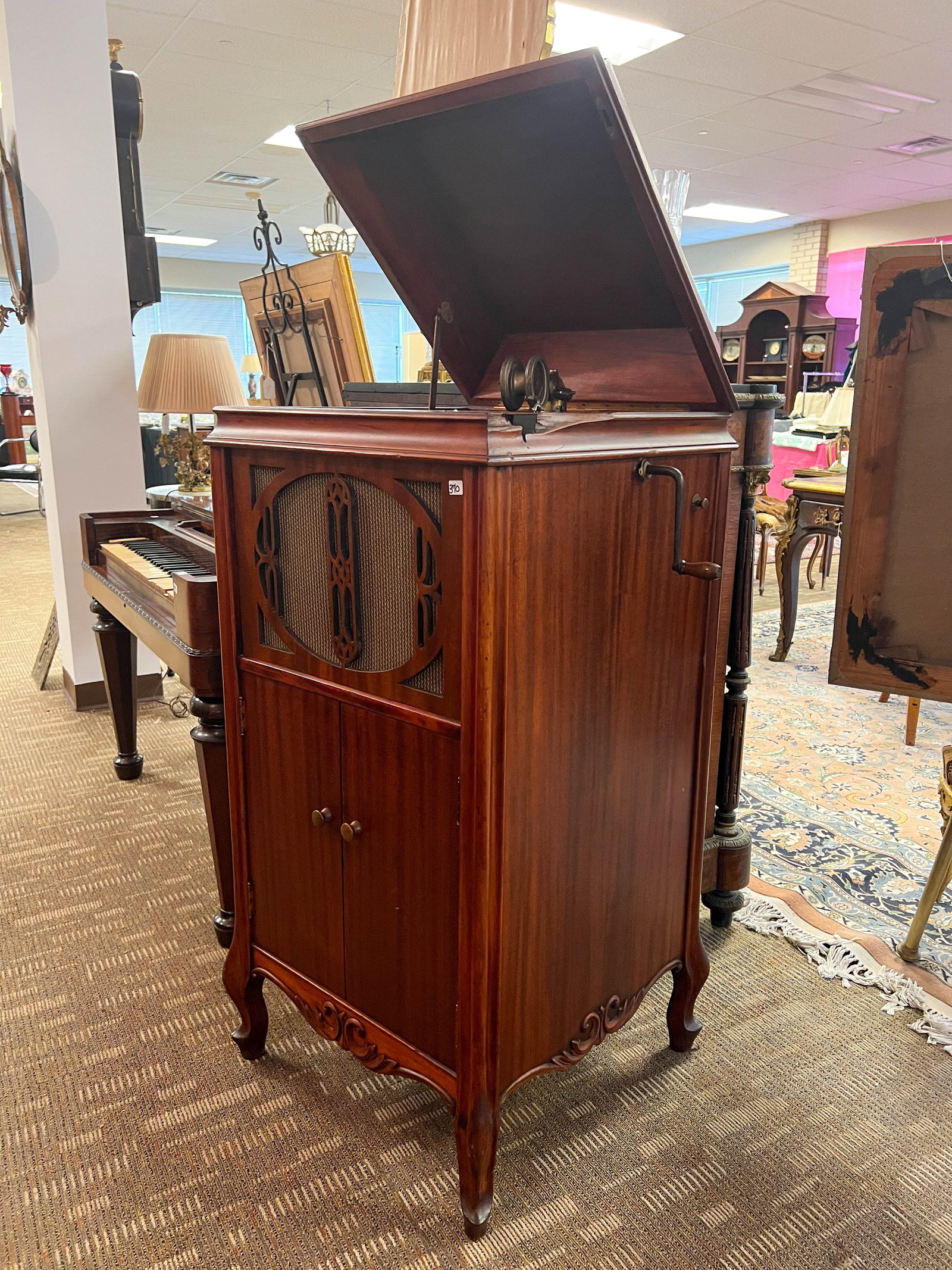 Floor standing Victrola that has been refinished, working condition. Minor damage to side lock noted: Floor standing Victrola that has been refinished, working condition. Minor damage to side lock noted.47 inches tall, 22.5 inches wide, 22.5 inches deep.