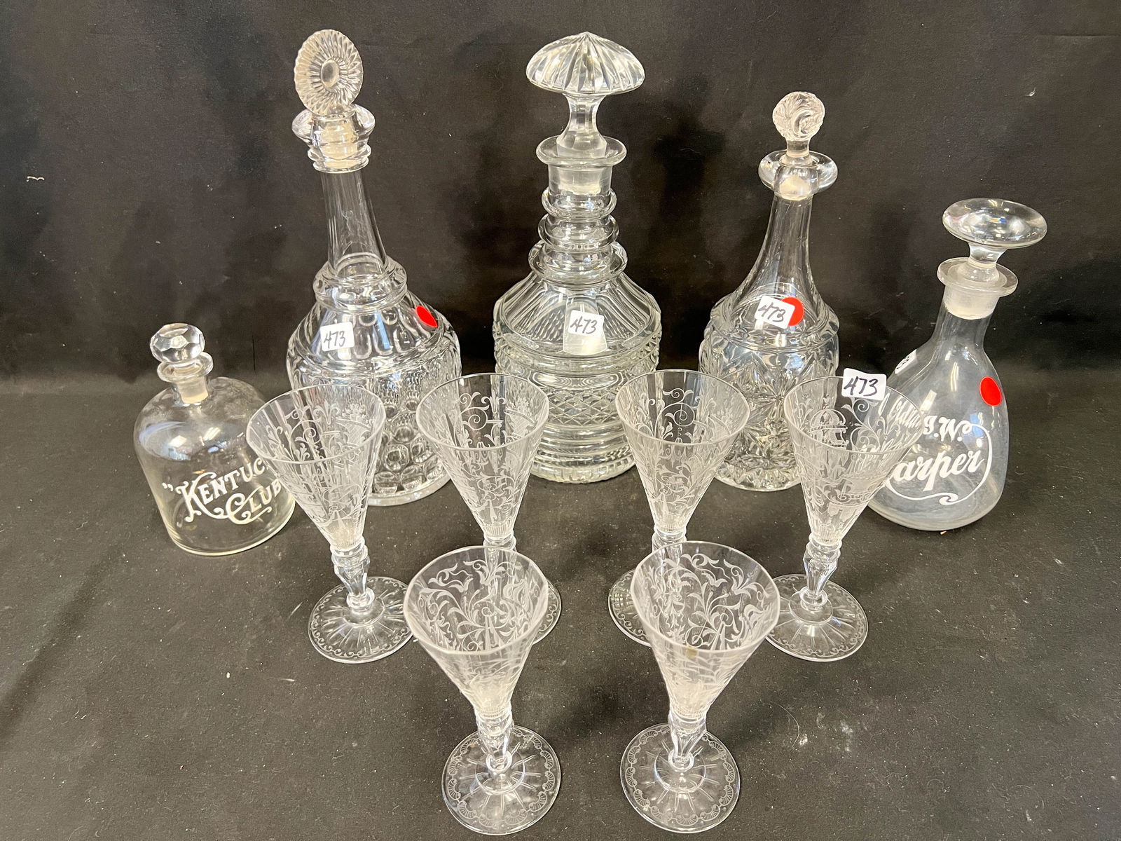 Group of late 18th/early 19th century decanters and goblets: Two 18th century decanters, early stemware and other decanters in a lot; 18th century decanters measure 11.5"T and 12.5"T