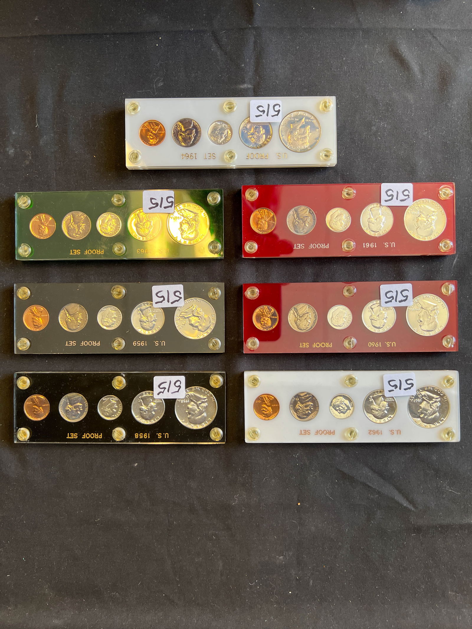 Seven U.S. Proof sets from 1958 -1964. Each one includes a Liberty silver half dollar, Liberty (1 of 5)