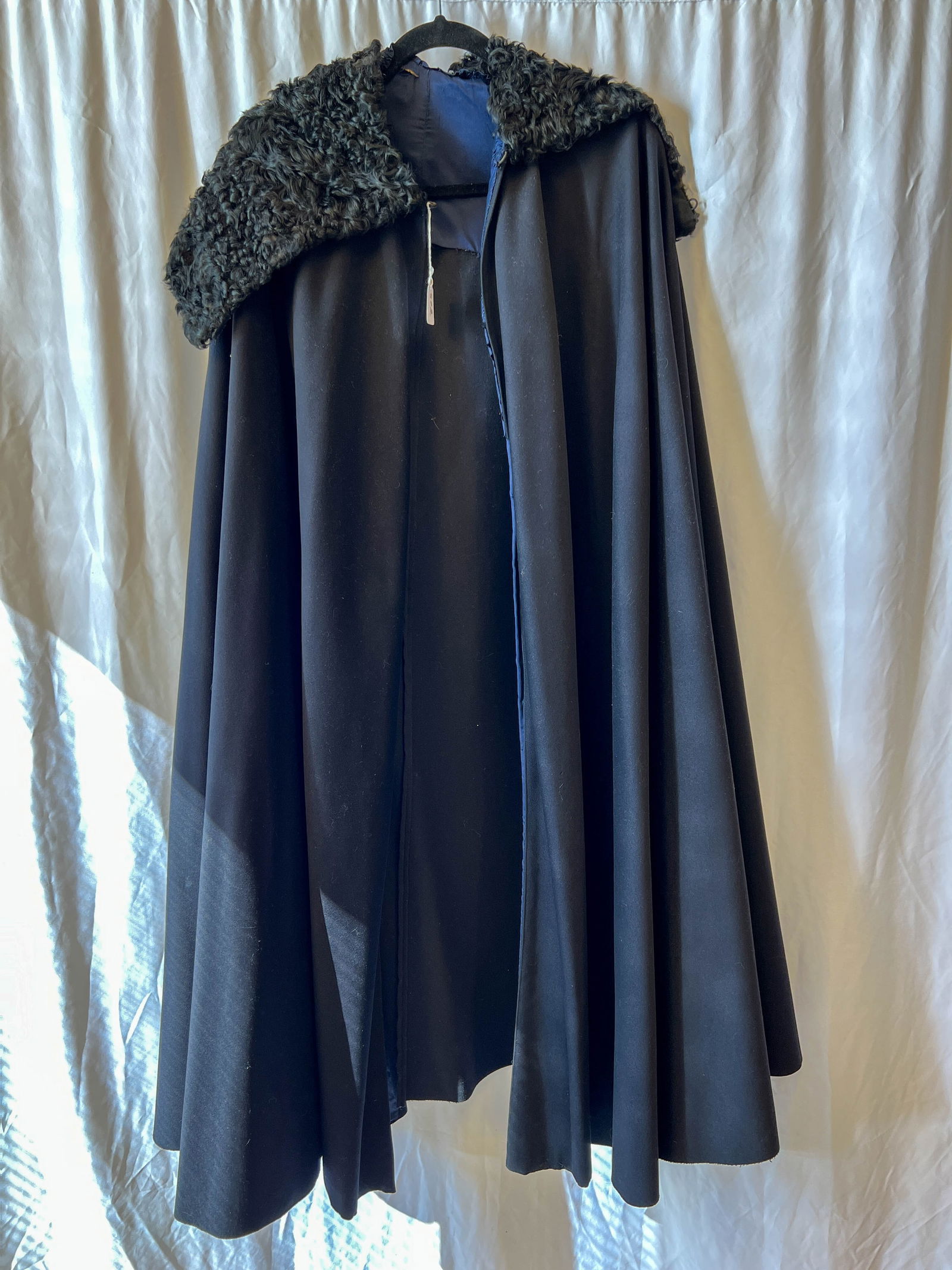 Black full length cape velvet material with karakul collar in good condition (1 of 3)