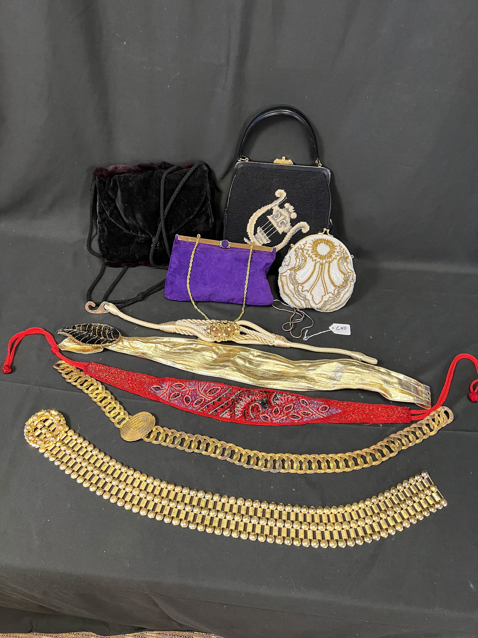 Large lot of designer hand bags and brass belts: Large lot of designer hand bags and brass belts