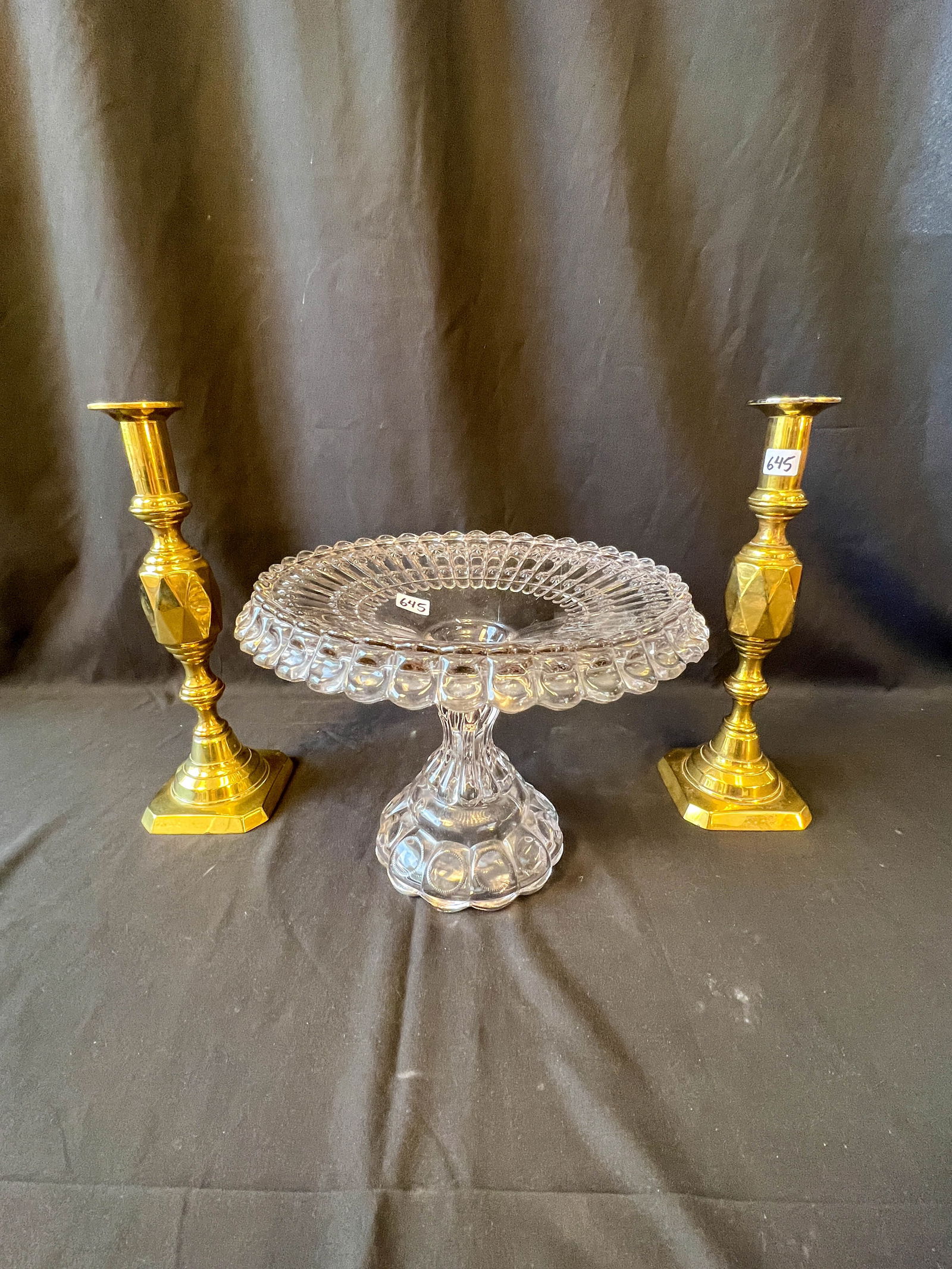 Pair of antique brass candlesticks; along with a pressed glass compote (1 of 5)