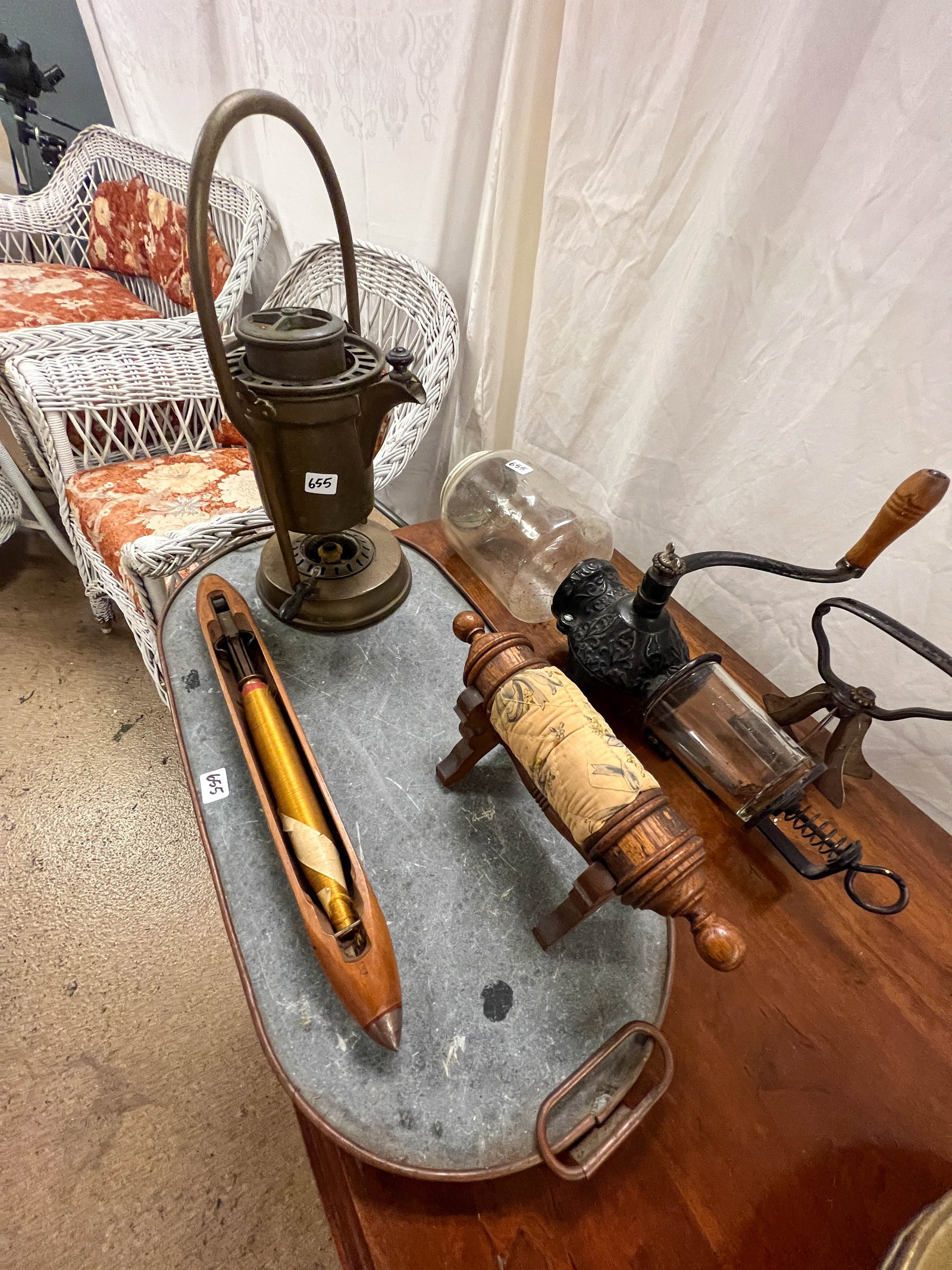 Group of primitives to include; crystal wall mount coffee grinder, an early star chopper, a pin (1 of 4)
