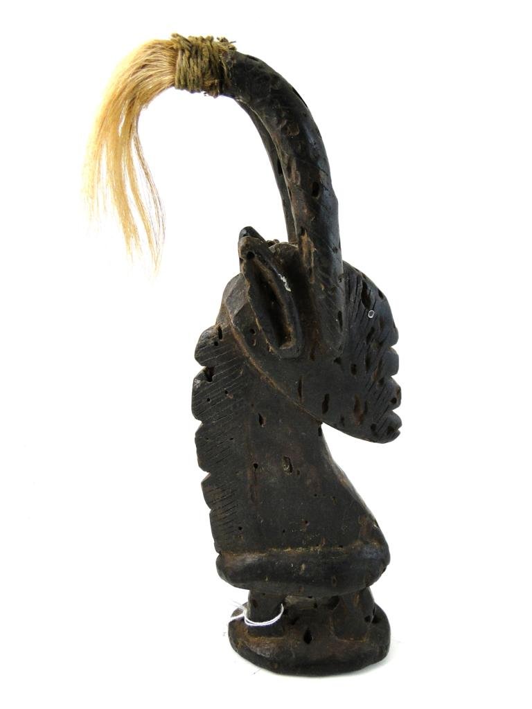 Chi Wara, Bamana tribe, from Mali, obtained in Obta: Chi Wara, Bamana tribe, from Mali, obtained in Obtained with Chicago collection pucchased in 1986, Chi Wara, N'tomo, Kore, Komo and Kono masks each distinctly represent different stages of Bamana male