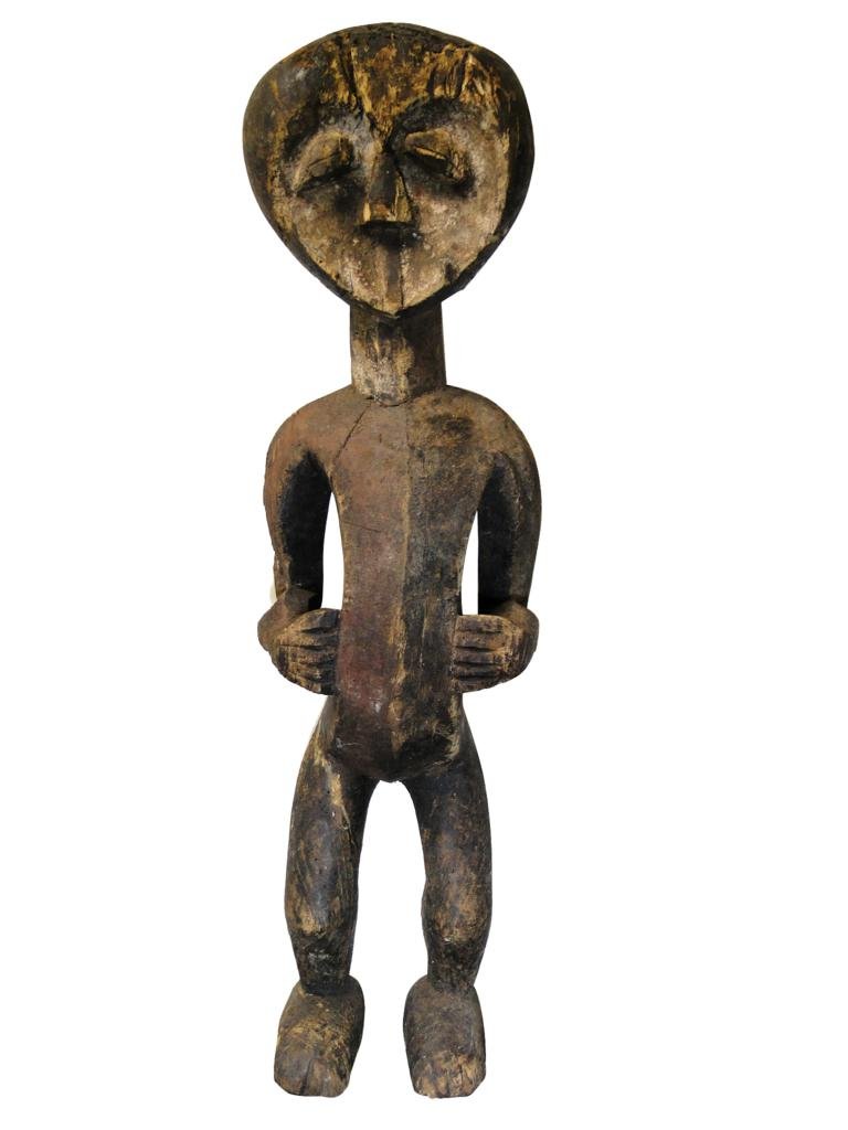 Ancestor figure with great age, Kwele tribe, from: Ancestor figure with great age, Kwele tribe, from Gabon, obtained in Camaroon, 1971, Rare statue for a knowledgable collector; masks are more common than statues with Kwele, measures 35"Hx9"Wx6"D, est